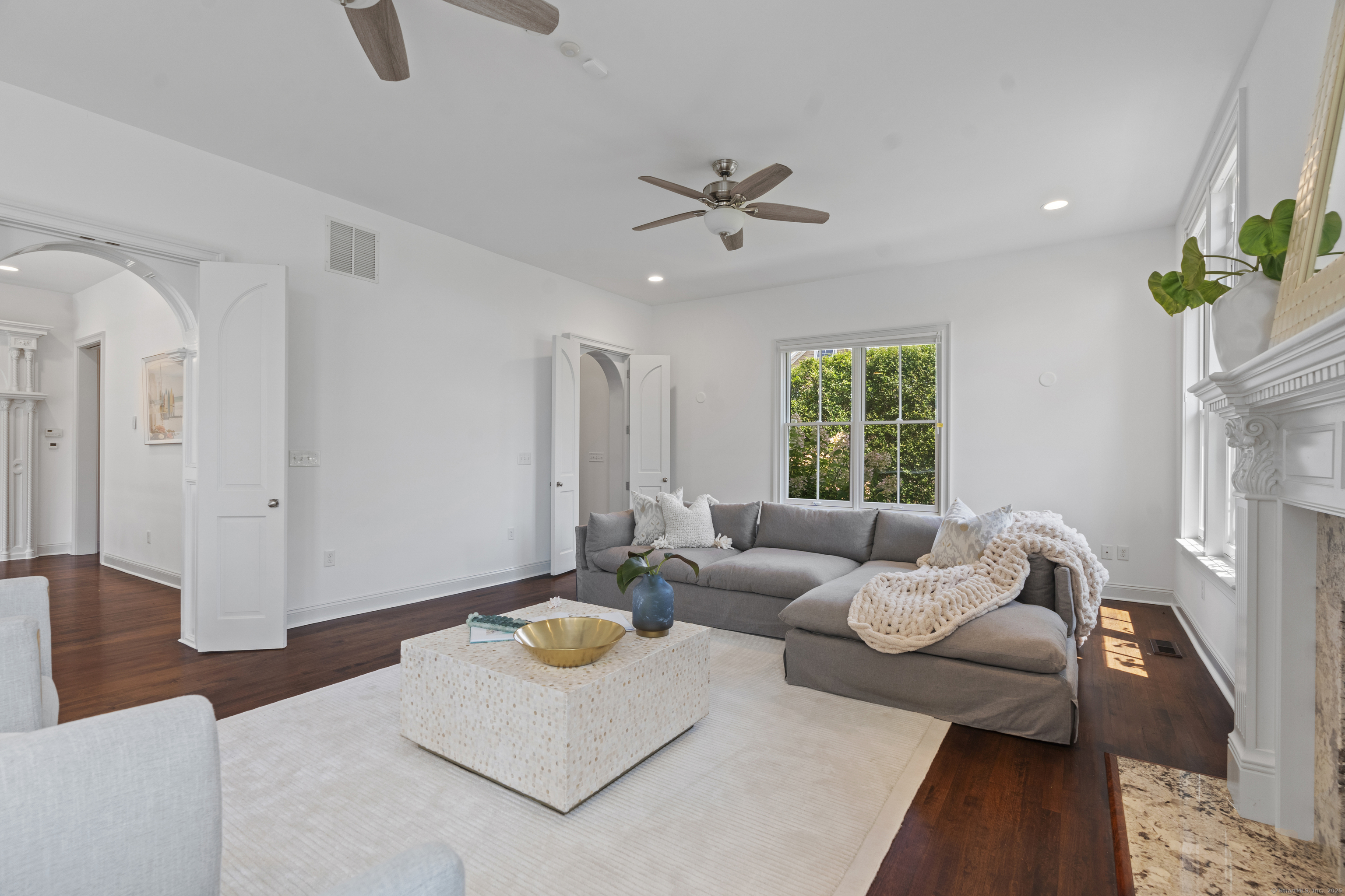 64 Webster Point Road Madison, CT 06443 - Photo 12 of 38 a living room with furniture and a window
