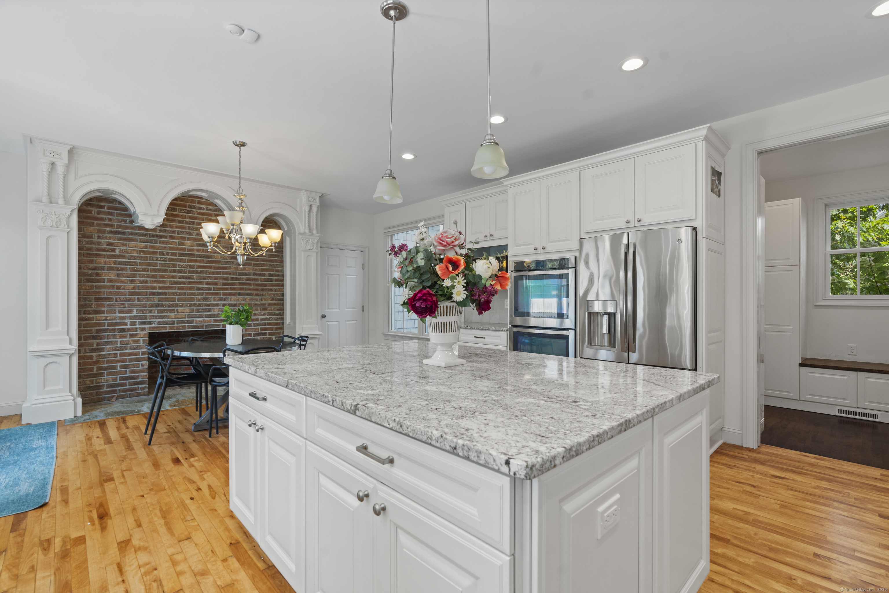 64 Webster Point Road Madison, CT 06443 - Photo 17 of 38 a kitchen with stainless steel appliances granite countertop a sink a oven and a refrigerator