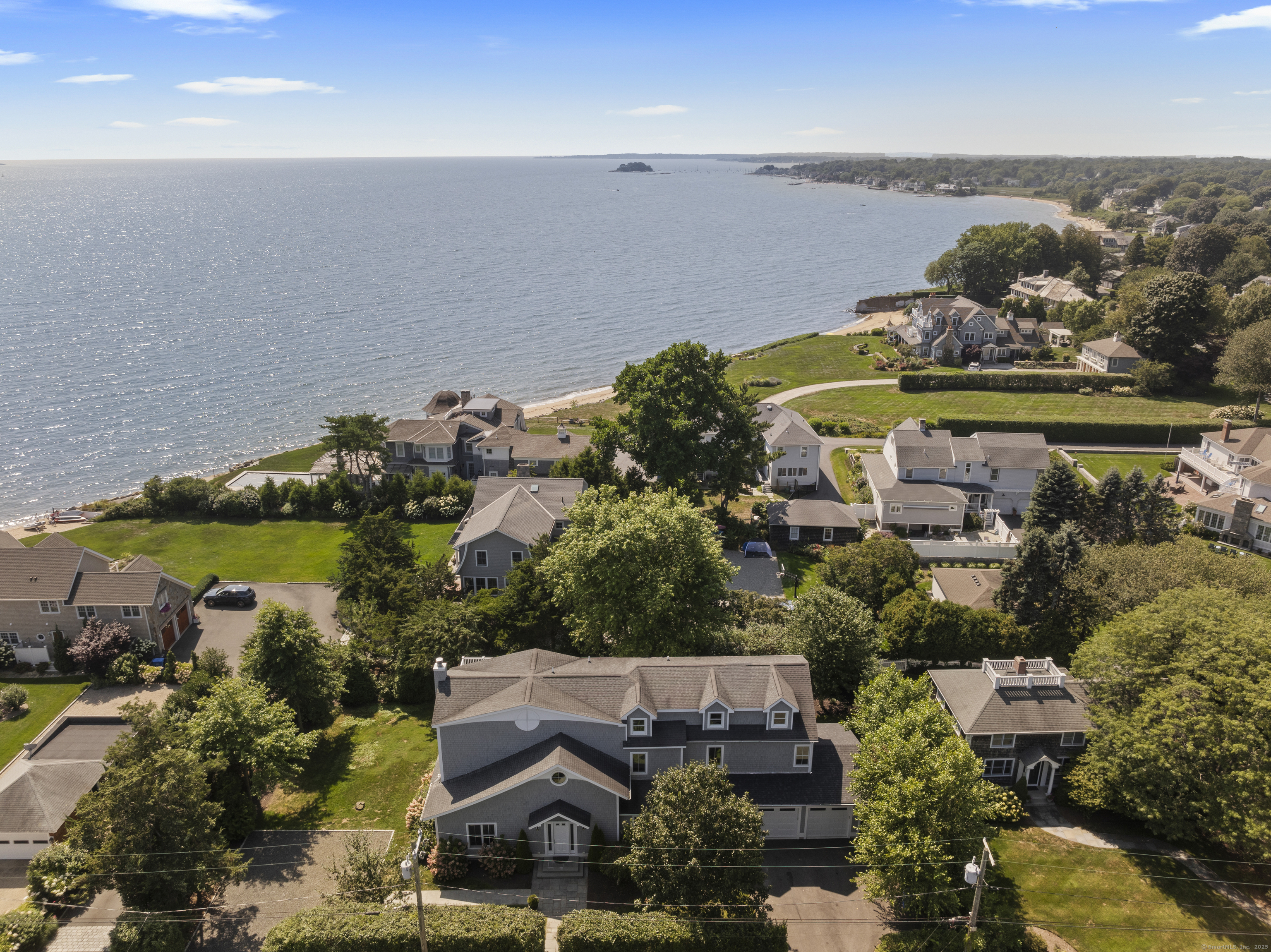 64 Webster Point Road Madison, CT 06443 - Photo 2 of 38 an aerial view of a house with a yard