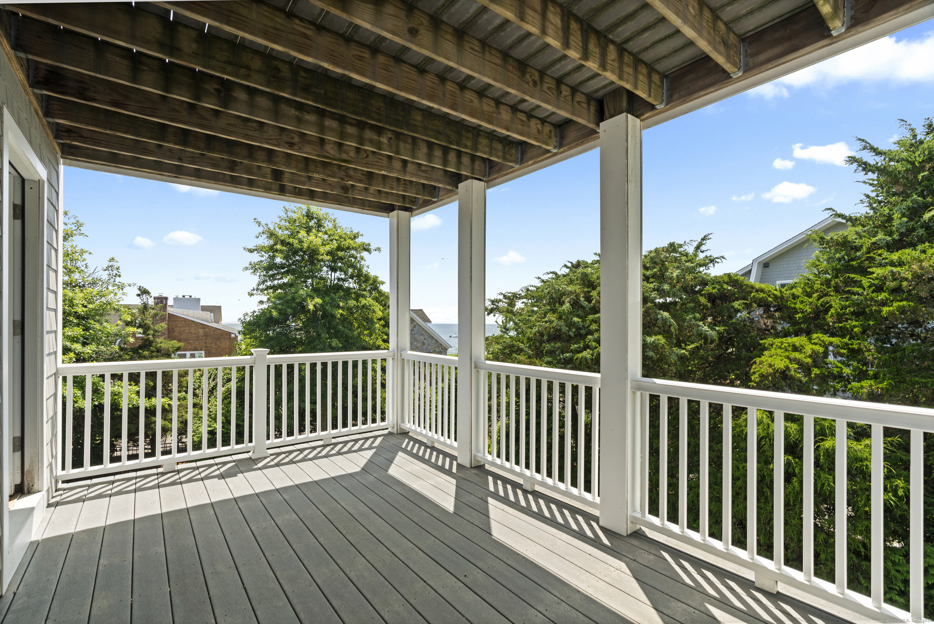 64 Webster Point Road Madison, CT 06443 - Photo 27 of 38 a view of a wooden deck