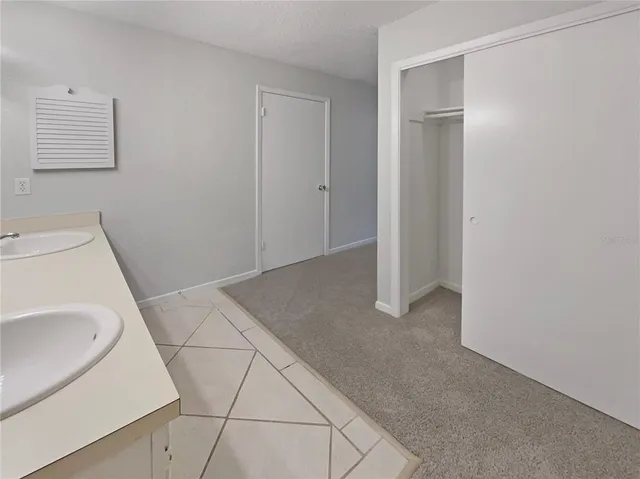 a bathroom with a sink and toilet