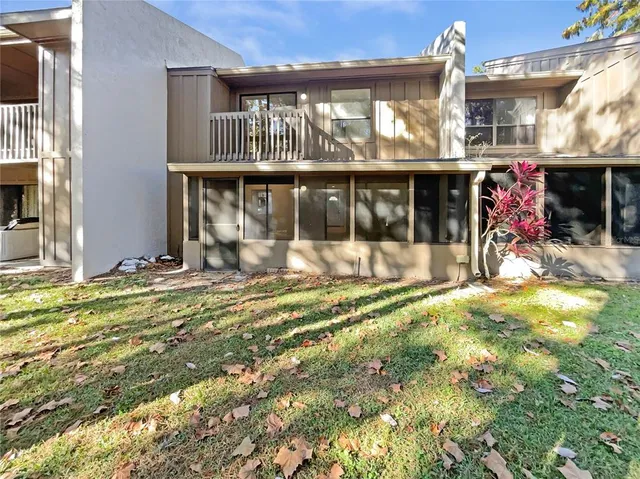 a view of a house with basketball court