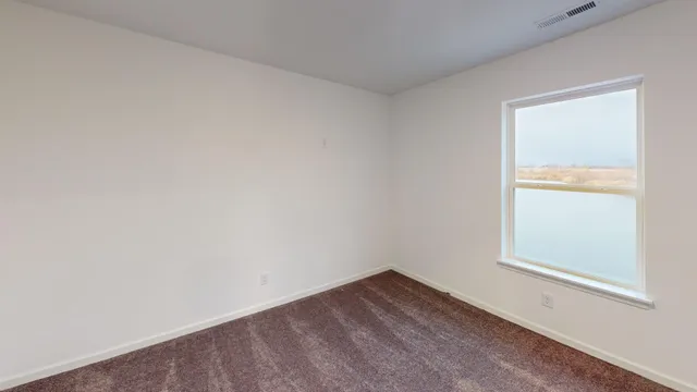 an empty room with a window