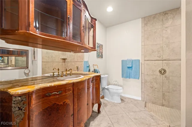 a bathroom with a bathtub and shower