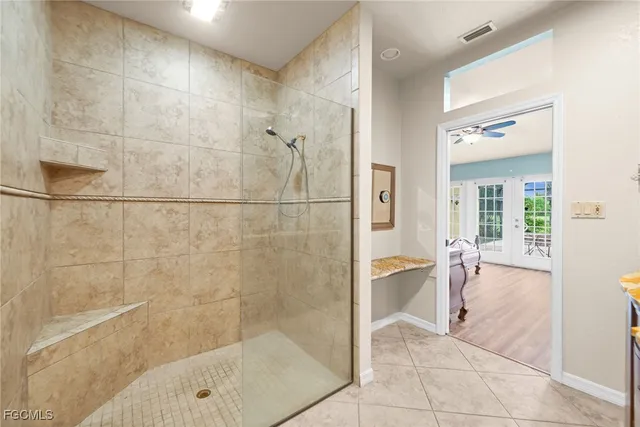 a view of a livingroom with furniture and a chandelier