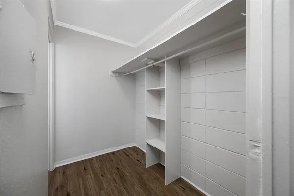 a bathroom with a toilet a sink and shower