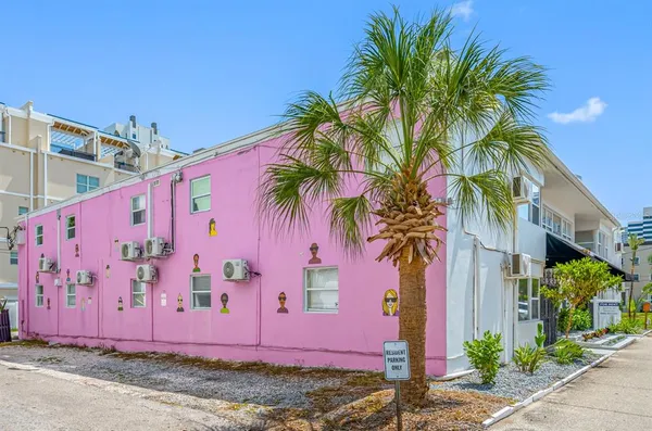 a view of a building with sitting area