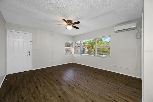 a kitchen with a stove sink and refrigerator
