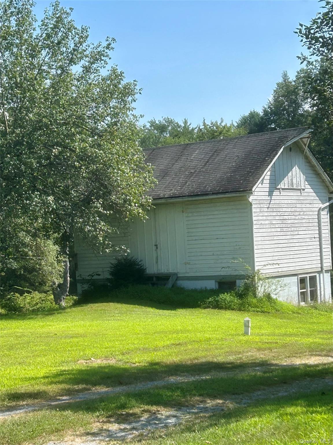 355-359 German Hill Road Shohola, PA 18458 - Photo 25 of 50 a view of a house with a yard