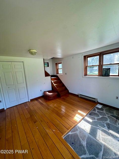 355-359 German Hill Road Shohola, PA 18458 - Photo 29 of 50 a bedroom with a bed and a window
