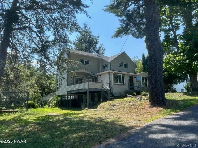 a kitchen with a sink cabinets and window