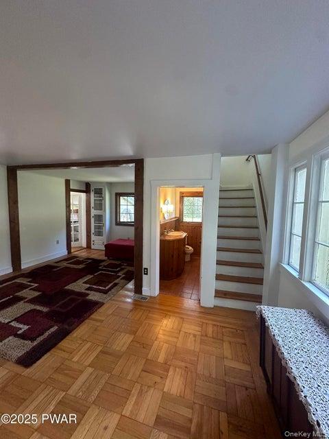 355-359 German Hill Road Shohola, PA 18458 - Photo 5 of 50 a view of a bedroom with furniture and staircase