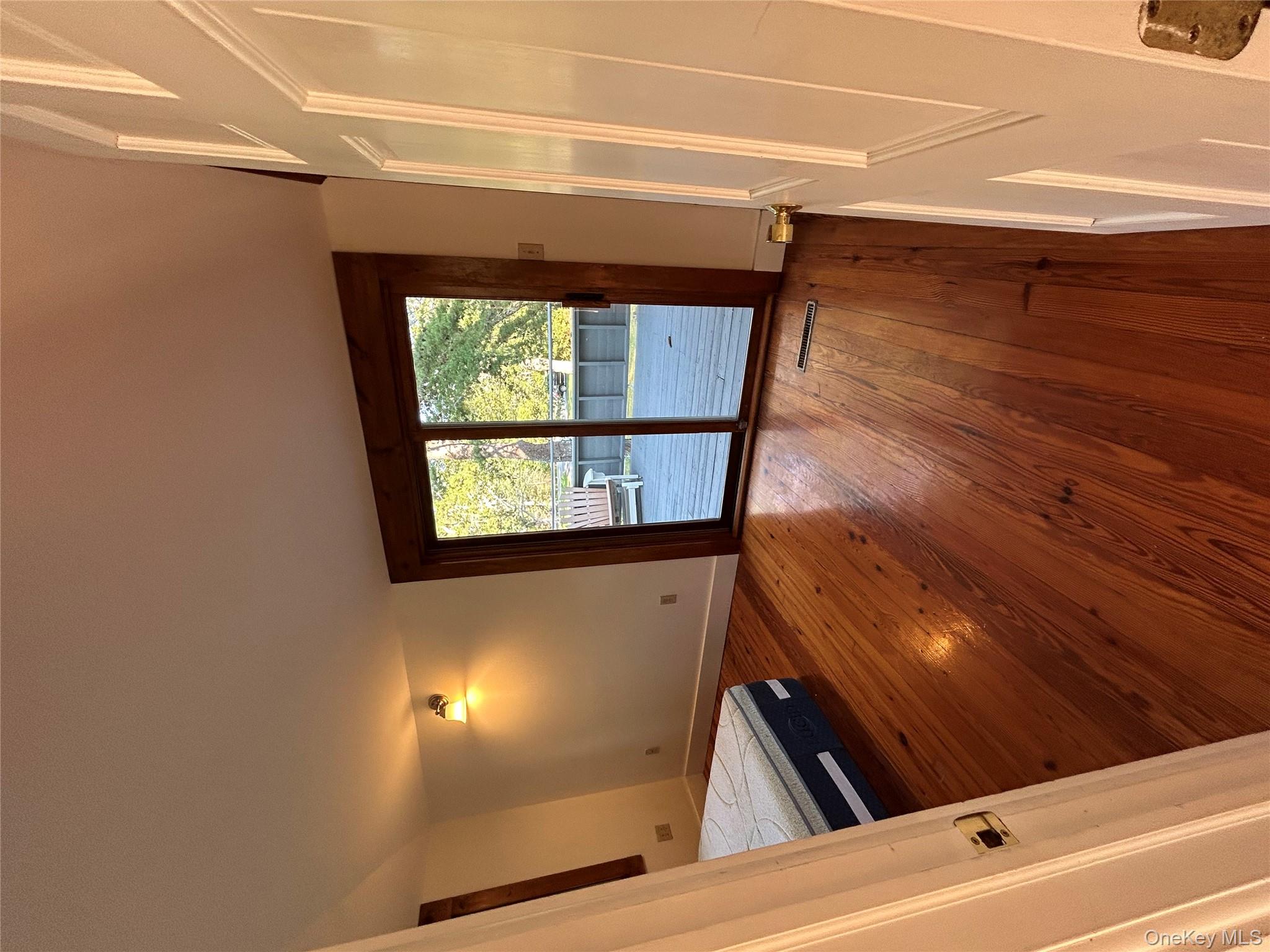 355-359 German Hill Road Shohola, PA 18458 - Photo 9 of 50 an empty room with wooden floor and windows