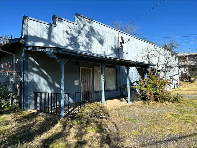 a view of a house with a garage