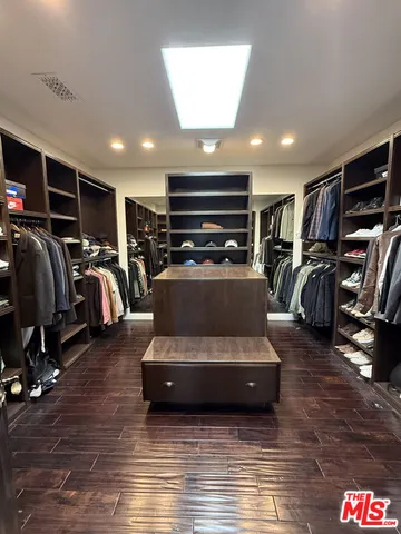 a view of a livingroom with furniture and wooden floor