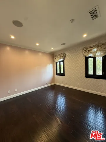 a view of swimming pool from a yard