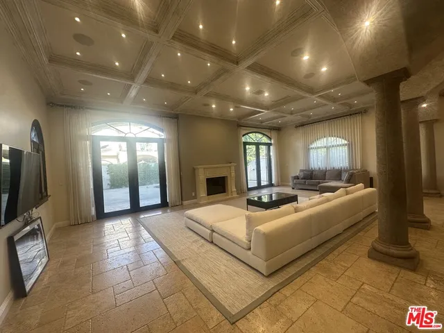 a living room with furniture and a couch