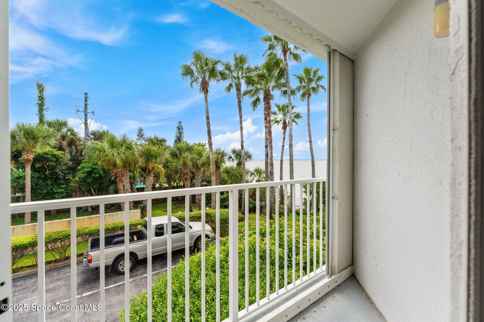 210 24th Street, Unit 201 Cocoa Beach, FL 32931 - Photo 2 of 41 Primary Balcony