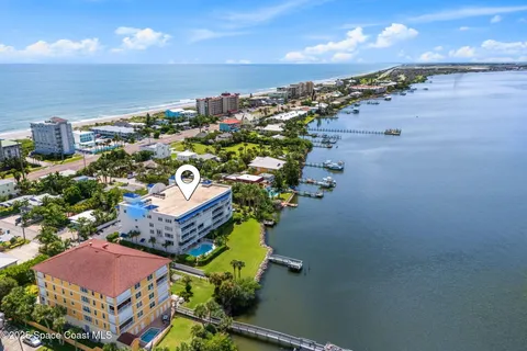 a view of a city with ocean view