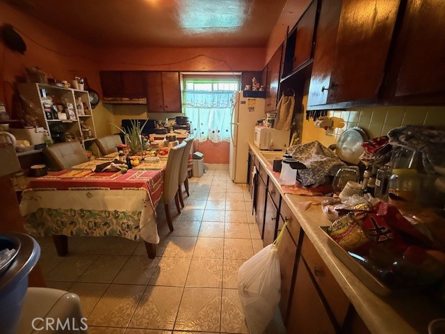 127 East 81st Street Los Angeles, CA 90003 - Photo 14 of 23 a storage room filled with furniture