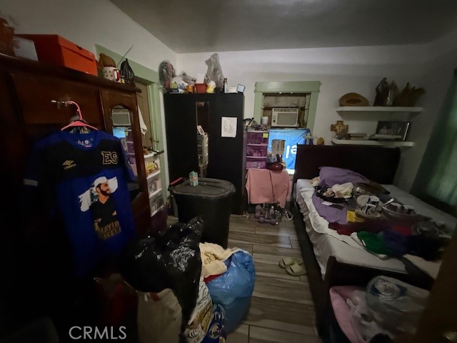 127 East 81st Street Los Angeles, CA 90003 - Photo 16 of 23 a living room with furniture and wooden floor