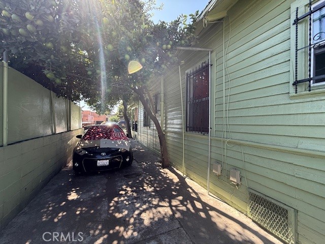 127 East 81st Street Los Angeles, CA 90003 - Photo 22 of 23 a car parked in front of a house