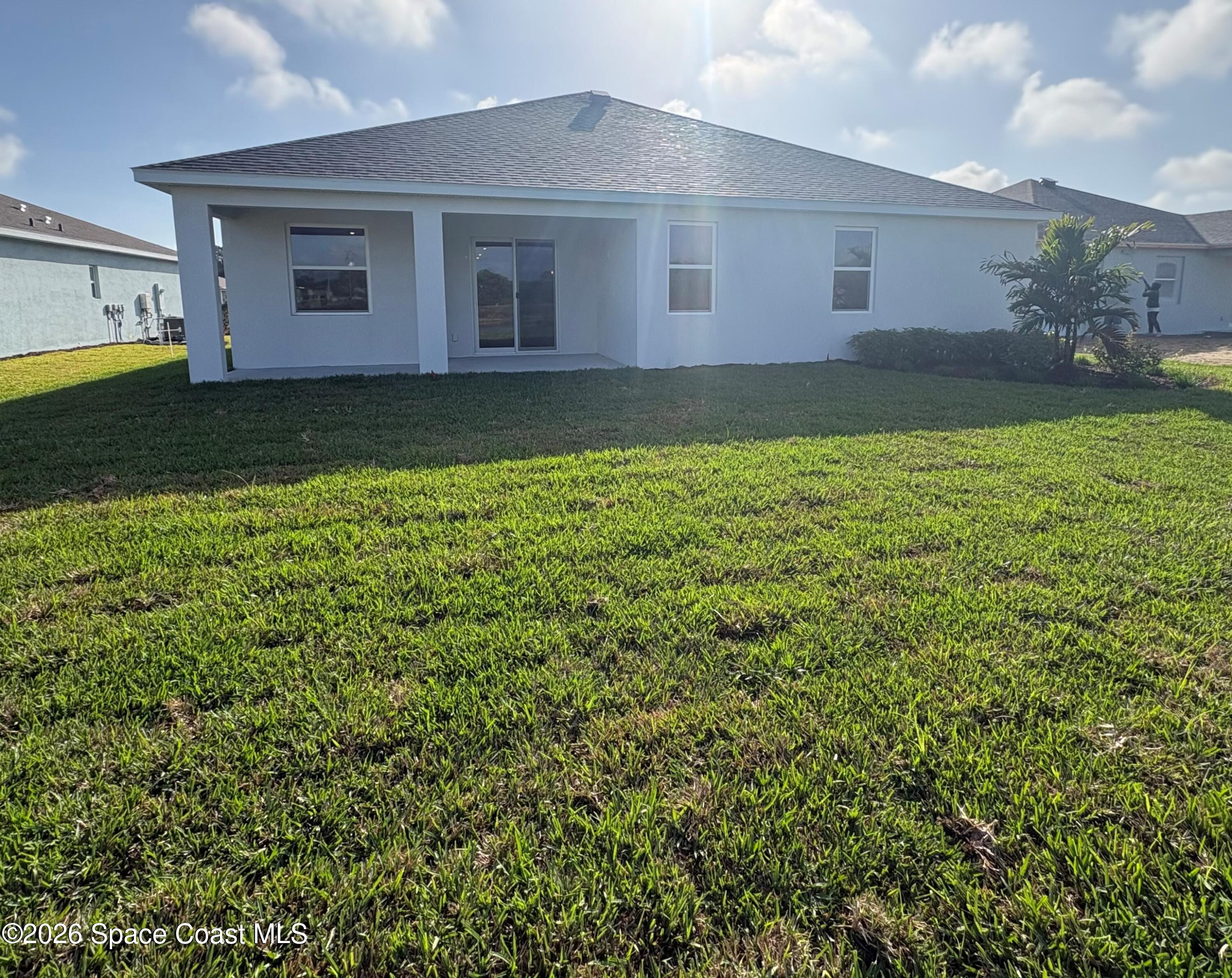 89 Jetty Lane Sebastian, FL 32958 - Photo 3 of 3 a view of a house with a yard