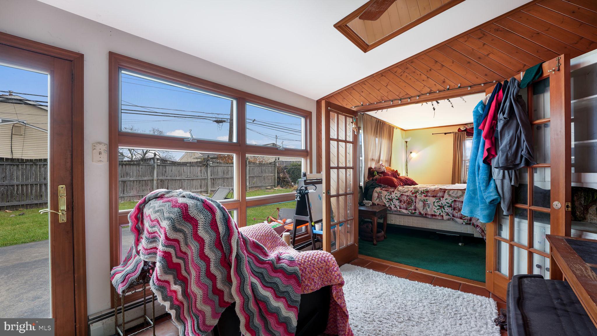 52 Post Lane Levittown, PA 19054 - Photo 12 of 26 a view of living room kitchen and entryway