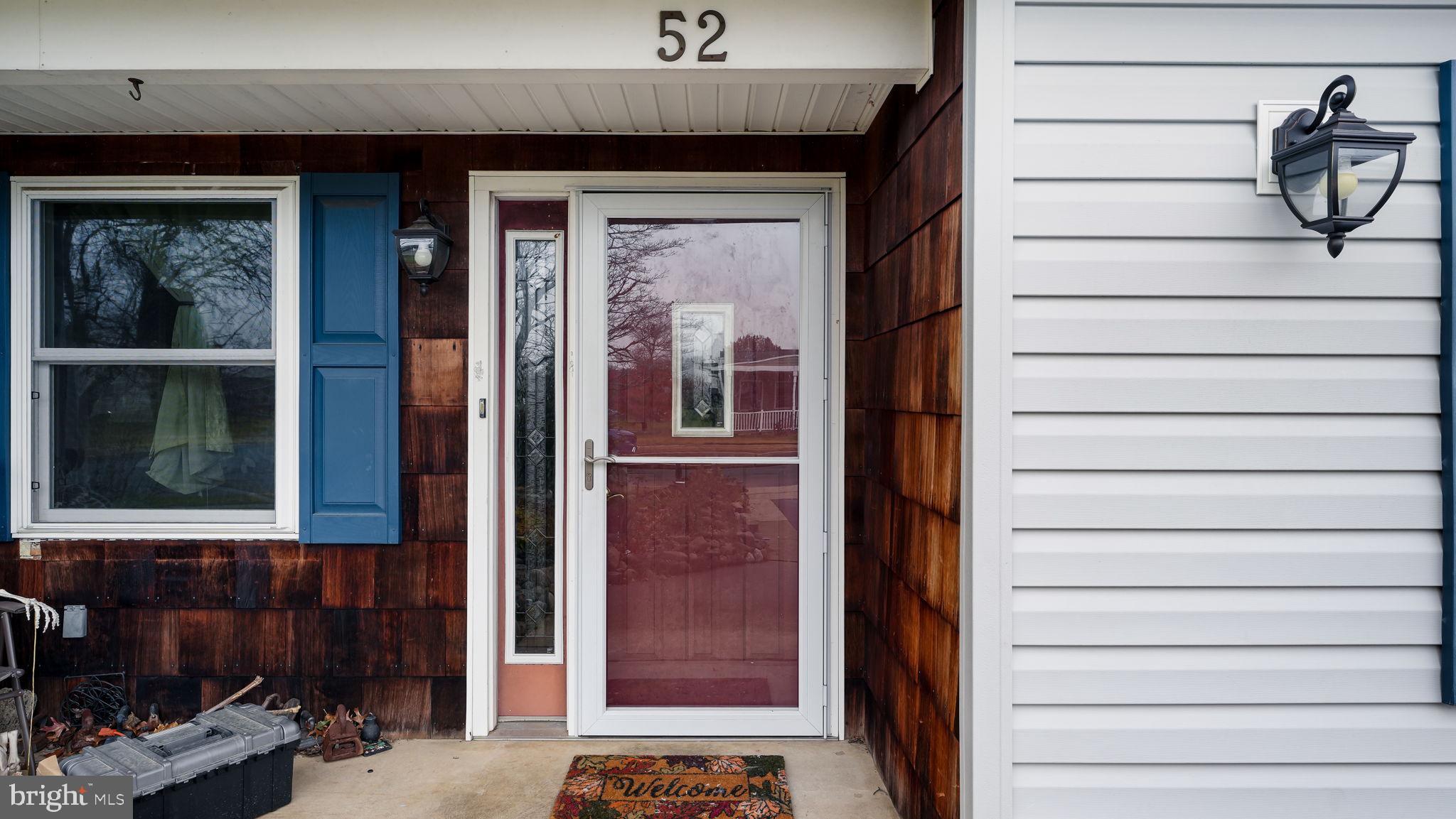 52 Post Lane Levittown, PA 19054 - Photo 25 of 26 a view of a door and chair and door