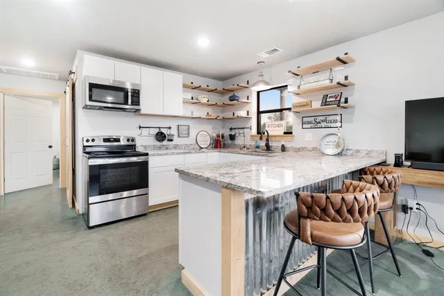 a living room with furniture