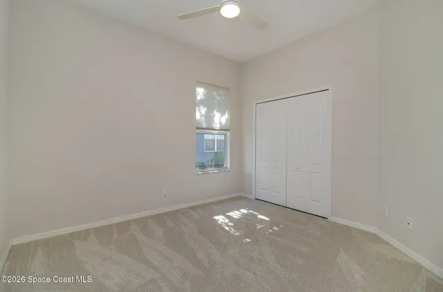 an aerial view of a house with outdoor space and lake view