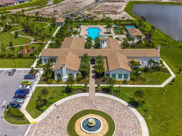 an aerial view of house with yard