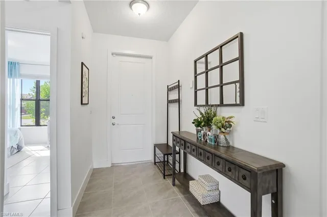 a kitchen that has a table and a chair in it