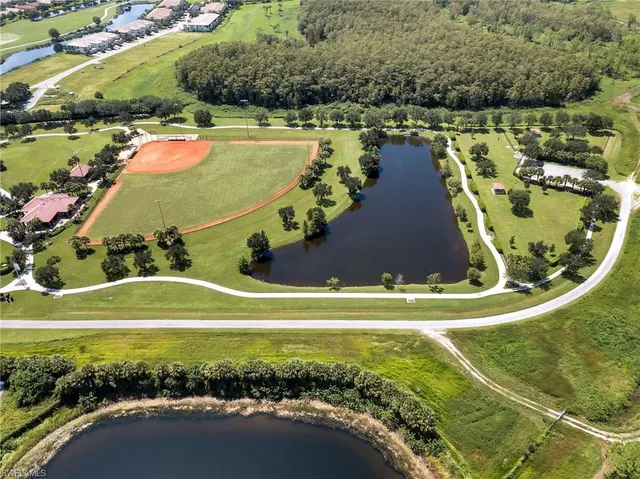 a view of a swimming pool with a lake view