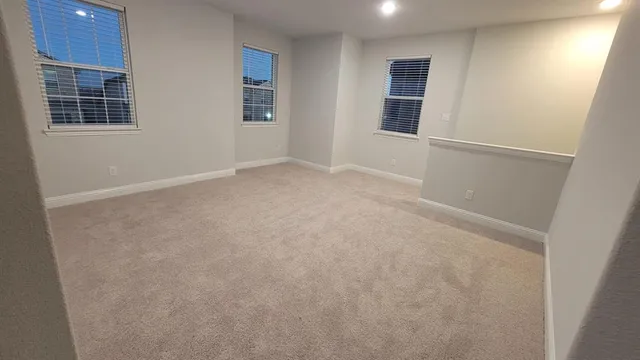 an empty room with windows