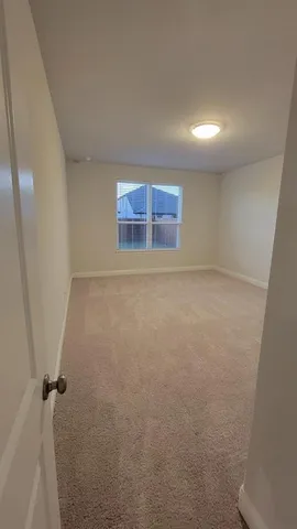 a view of a room with a barbeque