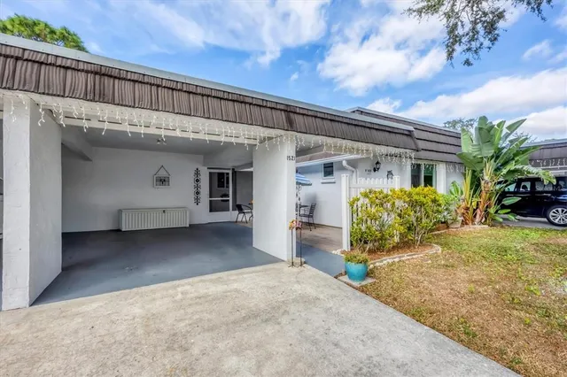 a view of a house with a porch