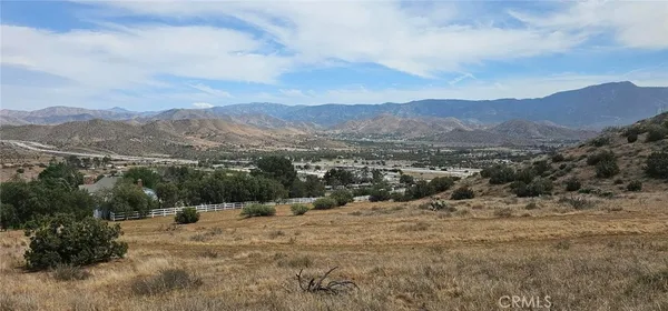 a view of a mountain with a outdoor space