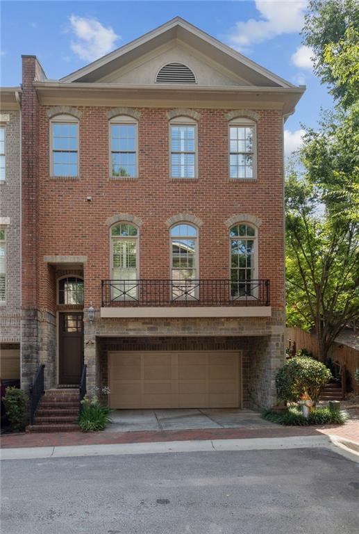 20 Candler Grove Drive Decatur, GA 30030 - Photo 1 of 1 a front view of a house with a garden