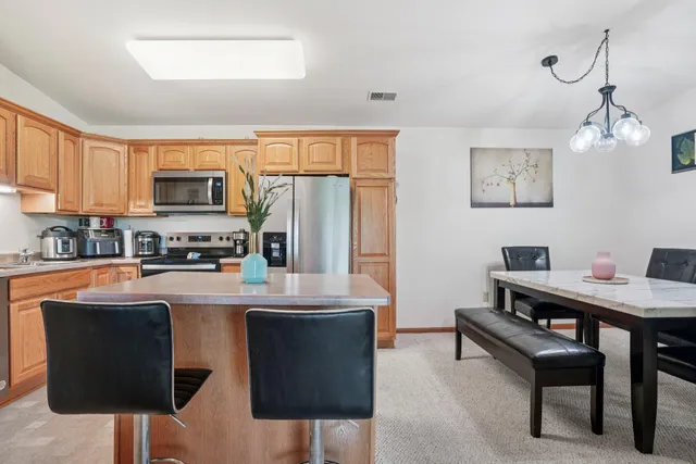 $310,000 | 1117 North Sunnyslope Drive, Unit 204, Mount Pleasant, WI 53406