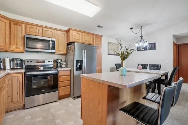 $310,000 | 1117 North Sunnyslope Drive, Unit 204, Mount Pleasant, WI 53406