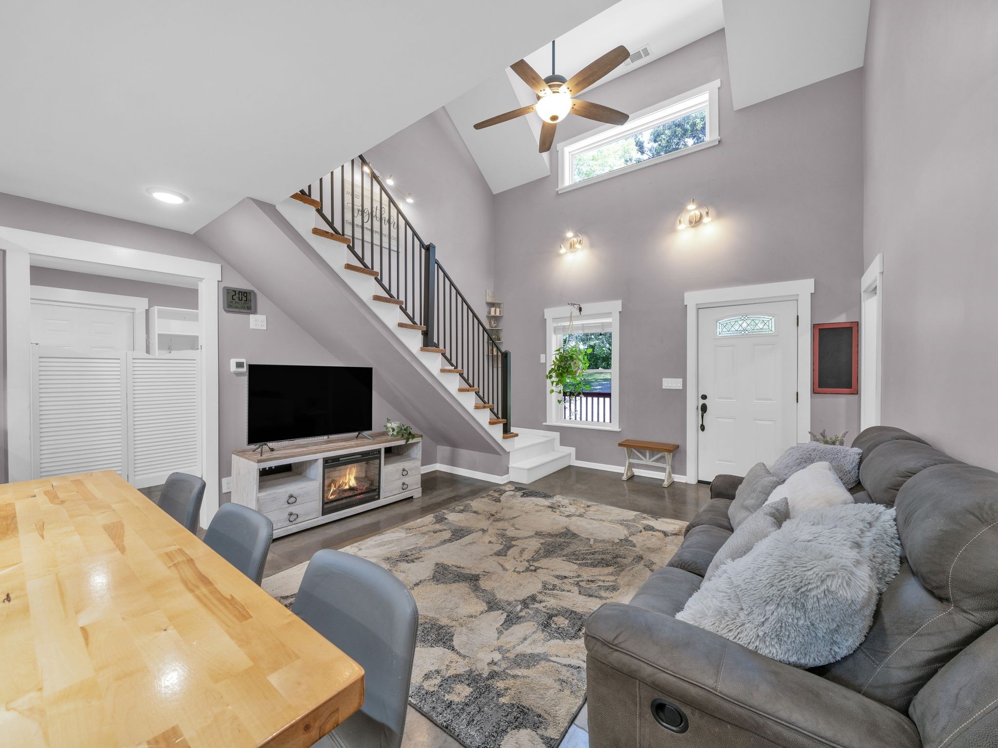 509 Iron Hill Road Burns, TN 37029 - Photo 13 of 40 a living room with furniture and a flat screen tv