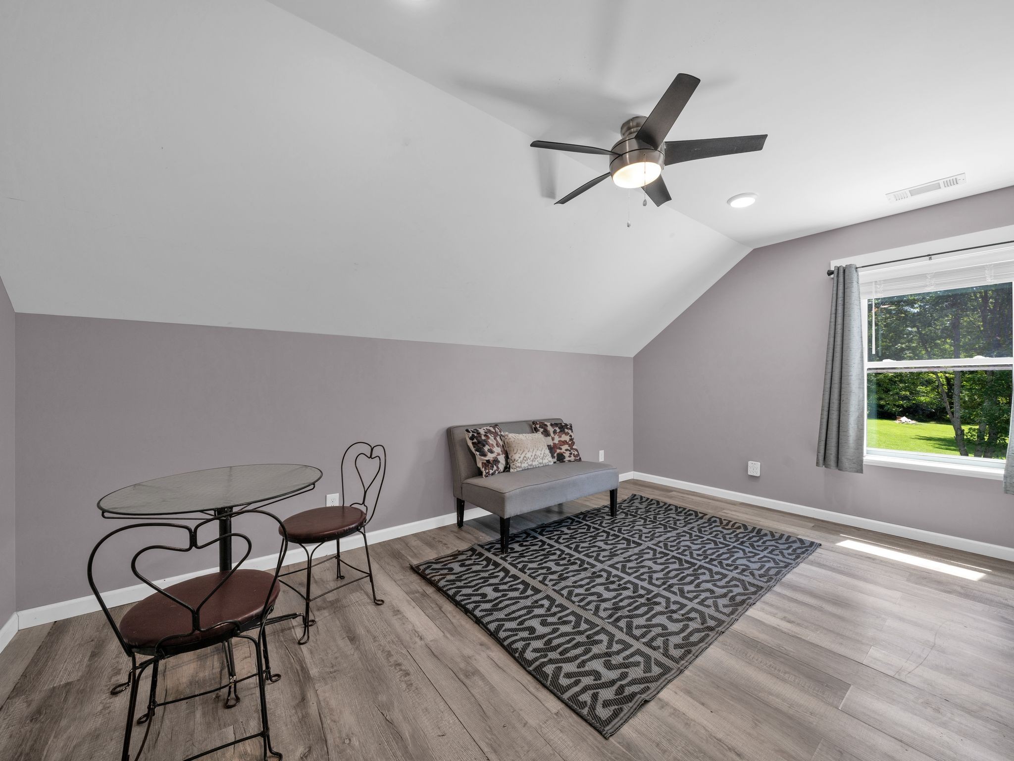 509 Iron Hill Road Burns, TN 37029 - Photo 28 of 40 a room with a couch and a window