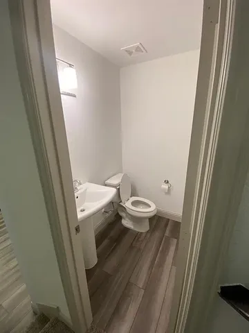 a bathroom with a sink and toilet