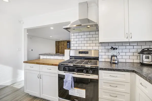 a bedroom with a bed and a desk