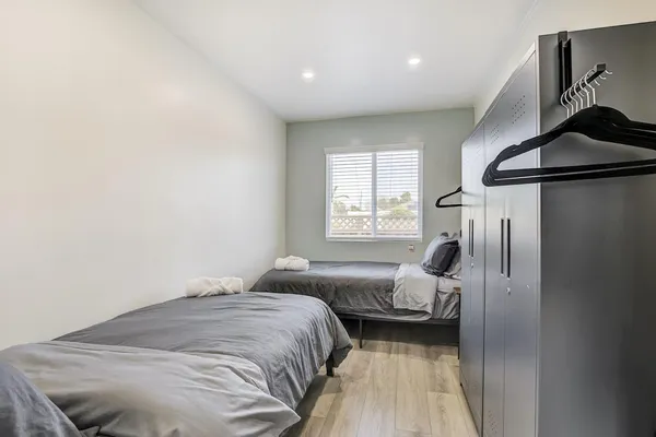 a view of a livingroom with a refrigerator