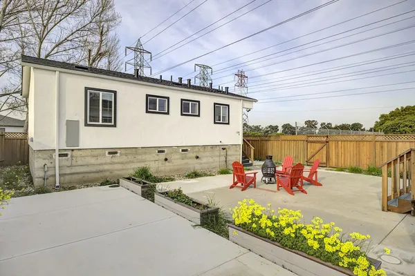 a bed room with a bed and a lamp