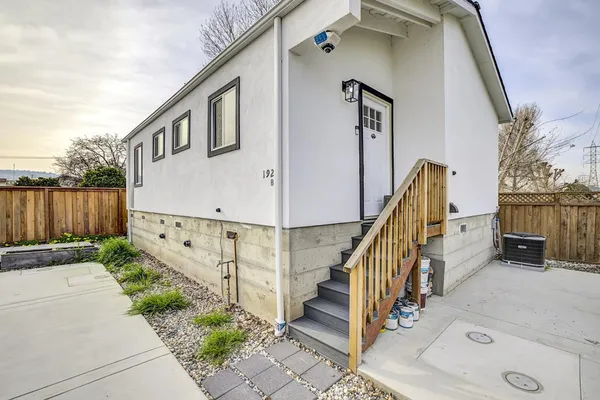 a bed room with a bed and a window