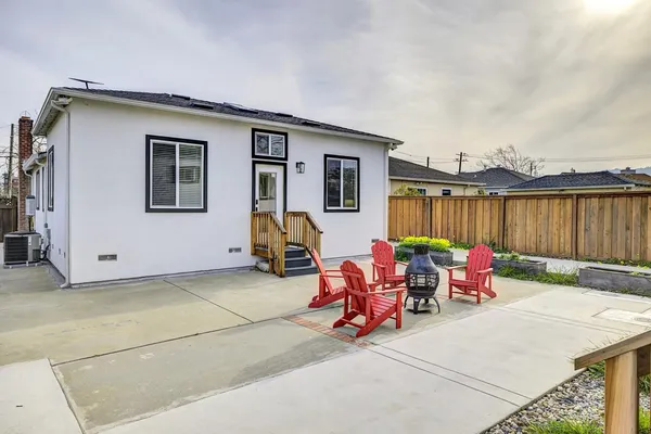 a bedroom with a bed and a table