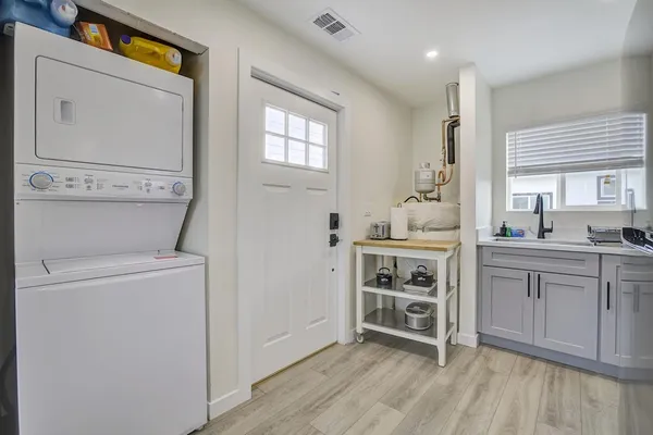 a front view of a house with a small yard